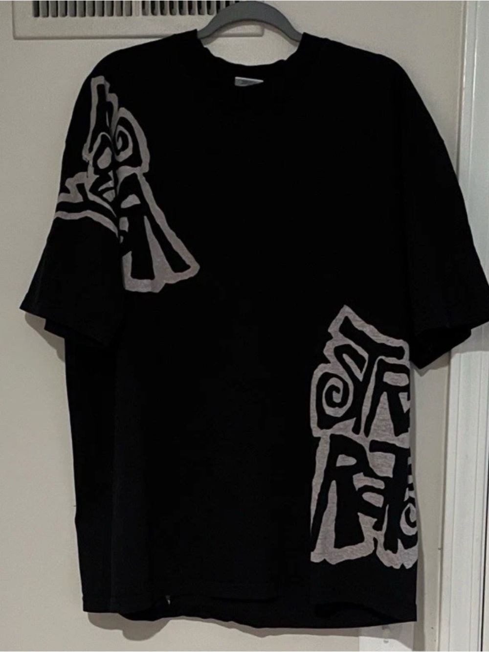 Men's Black Short‑Sleeve Graphic Tee with White Abstract Accents